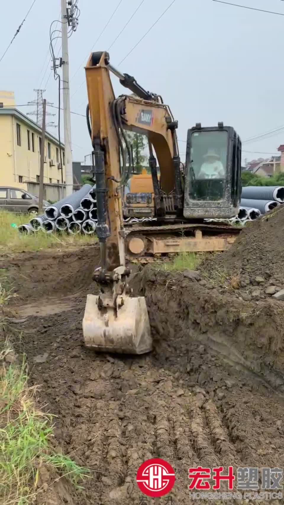 Frame from pipe installation in an excavation footage
